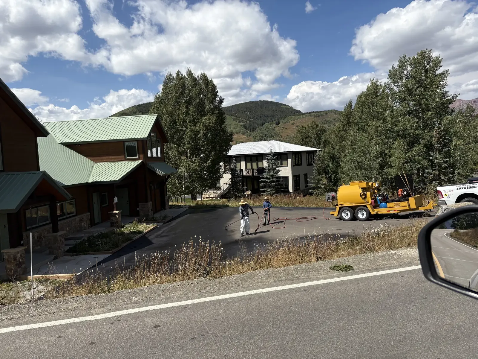 Olympic City Paving crew and equipment on a Colorado job site